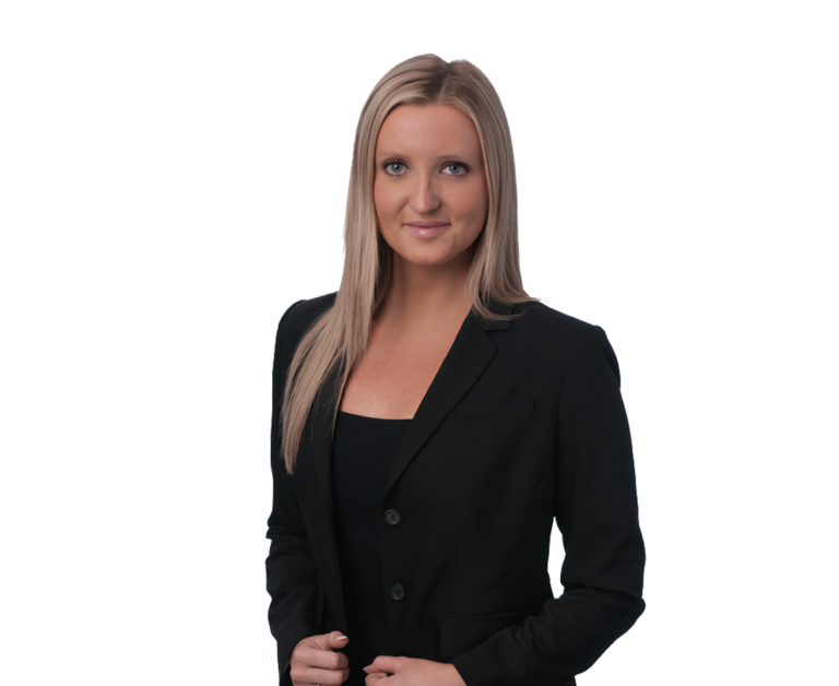 Hayley J. Mulherin - Real Estate Attorney. Woman dressed in black business suit.